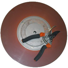 A pruning-hook and a disk platter
